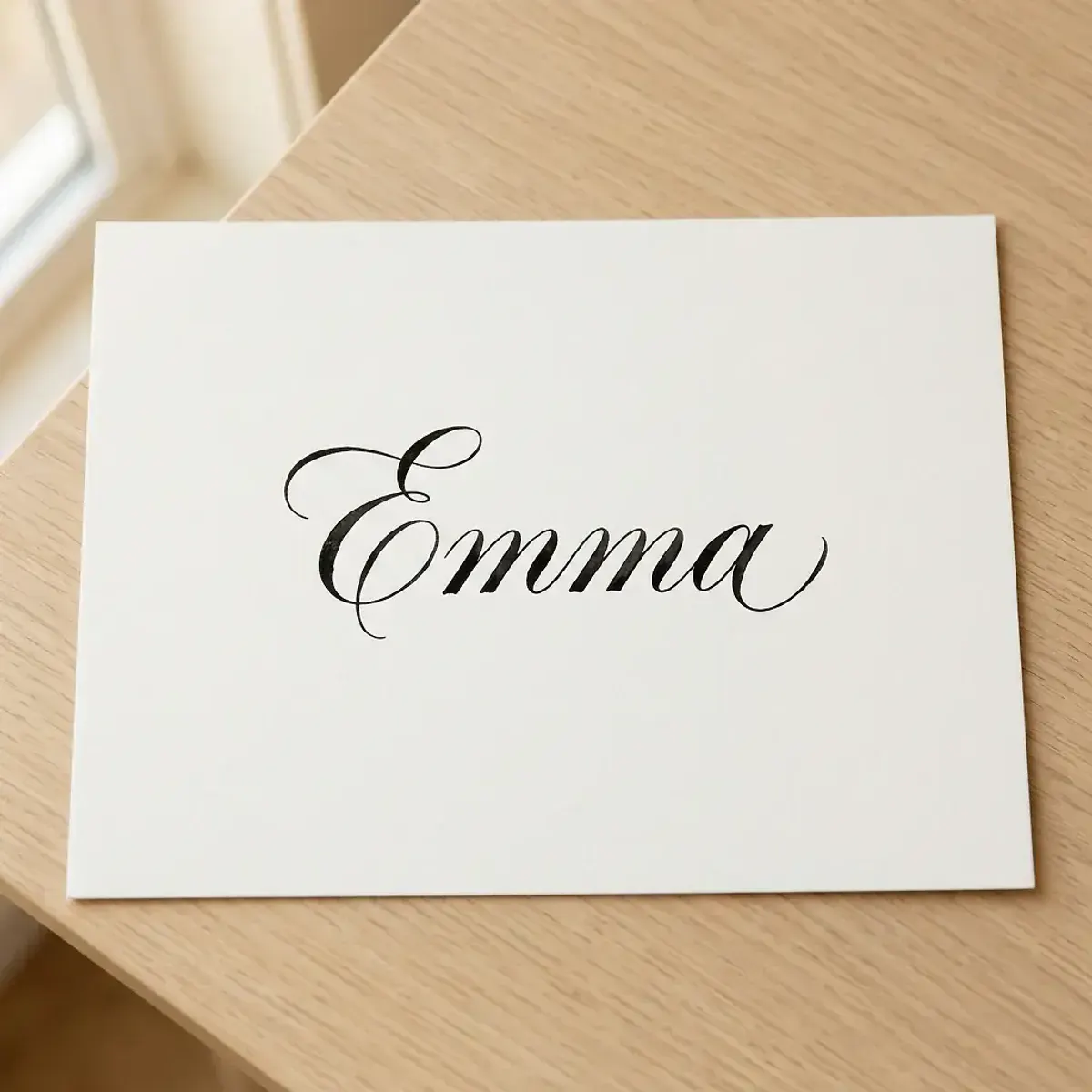 Calligraphie artistique du prénom Emma