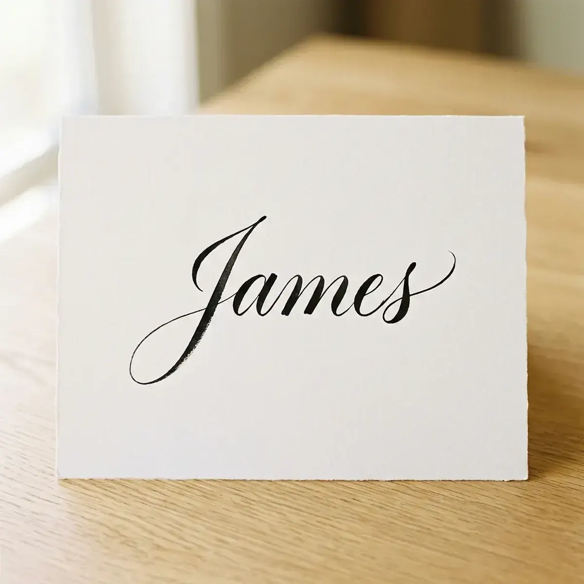 The name James in elegant calligraphy