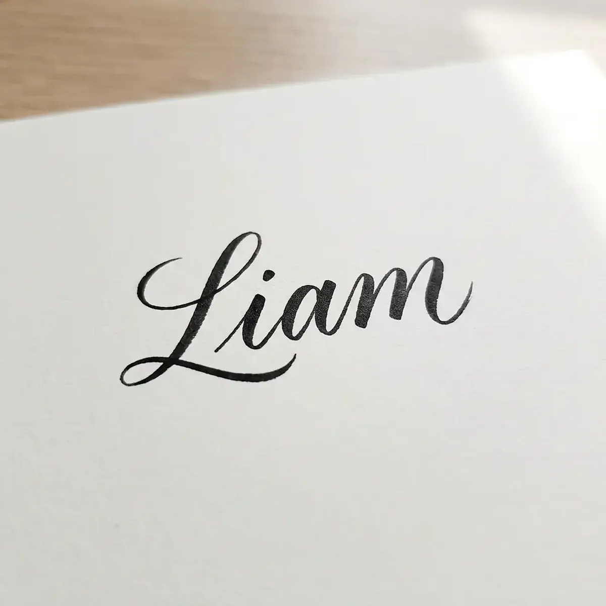The name Liam in elegant calligraphy