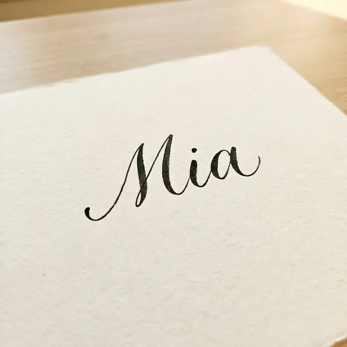 The name Mia in elegant calligraphy