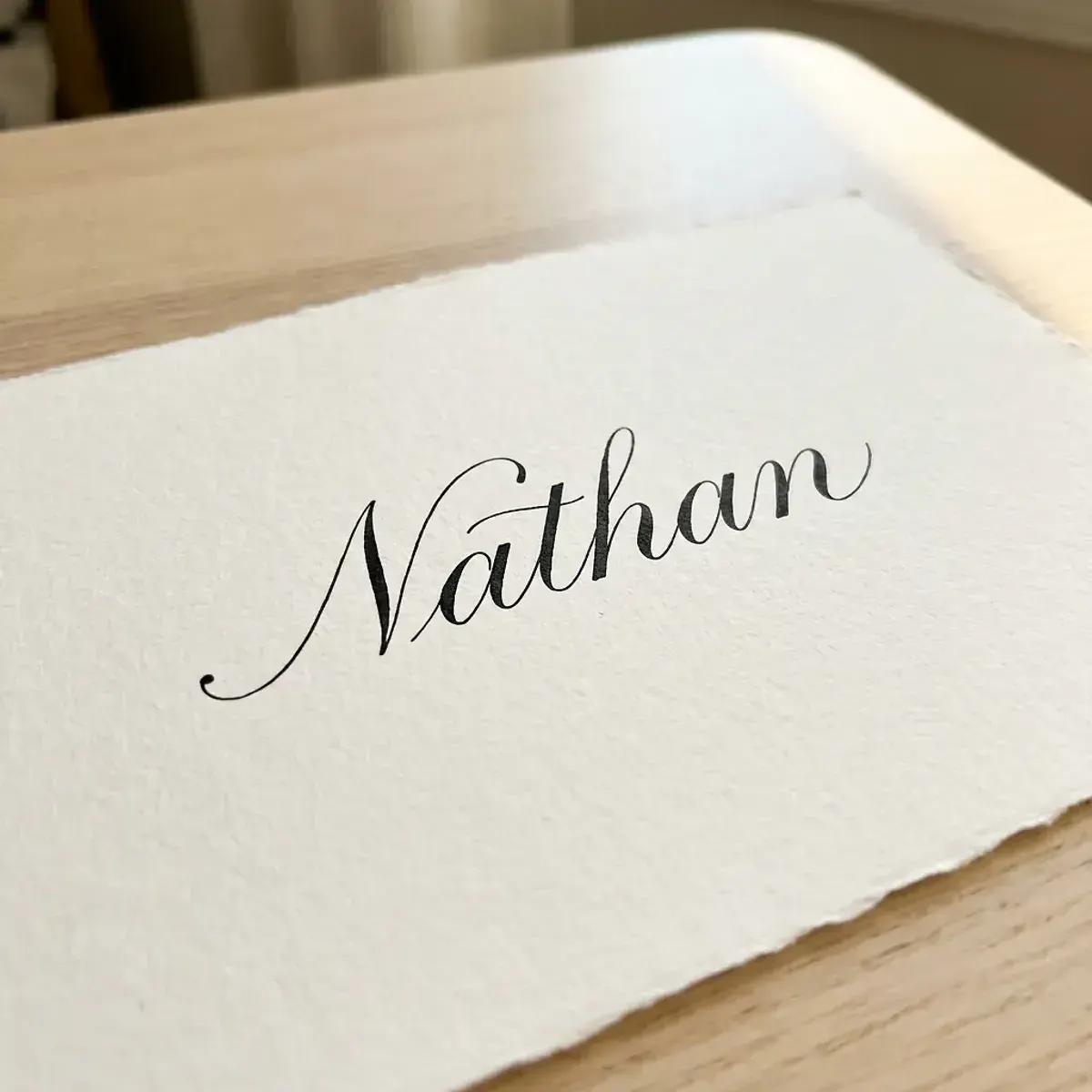 The name Nathan in elegant calligraphy