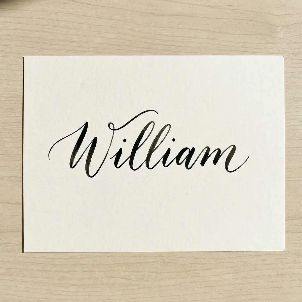 The name William in elegant calligraphy